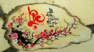 qua-tang-nghe-thuat-ong-do-viet-thu-cong-tren-go